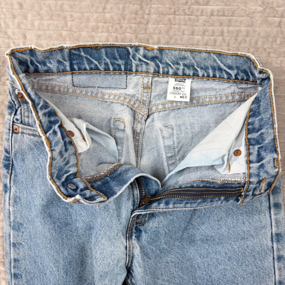 Vintage Levis 560 Loose Fit Straight Leg Jeans Light Wash Made in USA Size 3 Med
